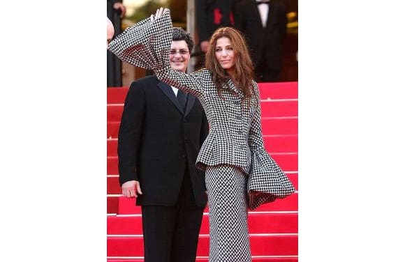 Catherine Keener just fails to impress us in this 1970's style chequered dress, with bell sleeves.