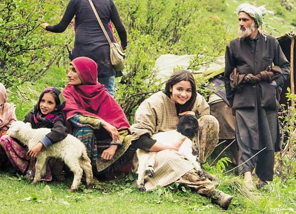 A cute Alia Bhatt poses for the lenses on the sets of 'Highway' in Kashmir. Directed by Imtiaz Ali, the film stars Randeep Hooda across Alia.