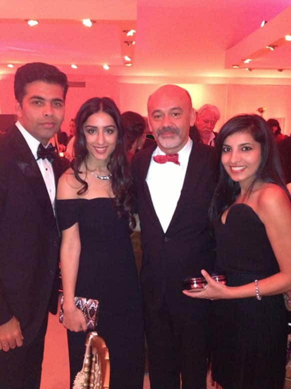 (From left to right) Karan Johar, ‘Bombay Talkies’ producer Ashi Dua and luxury shoes giant Christain Louibotton at the Cannes film fest.