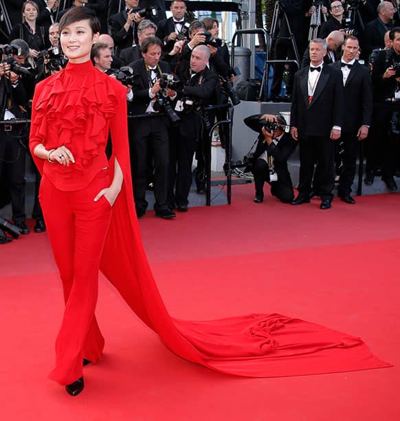 Actress Li Yuchun arrives for the screening of Behind the Candelabra at the 66th international film festival, in Cannes.