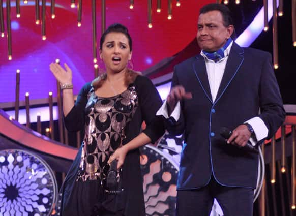 'Ghanchakkar' Vidya Balan shaking a leg with Mithun Chakraborty on the sets of a reality dance show.