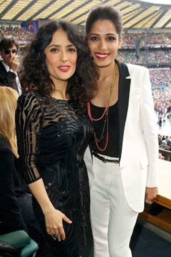 Hollywood beauties Salma haeyk and Freida Pinto at the Chime for Change Concert.