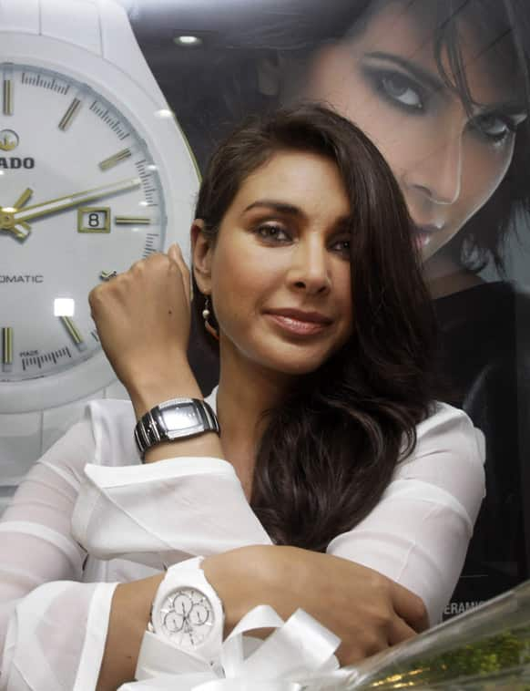 Lisa Ray poses with a diamond studded watch from Swiss watch maker Rado in Kolkata. The watch is from a new collection and the price range starts from $3800 approximately.