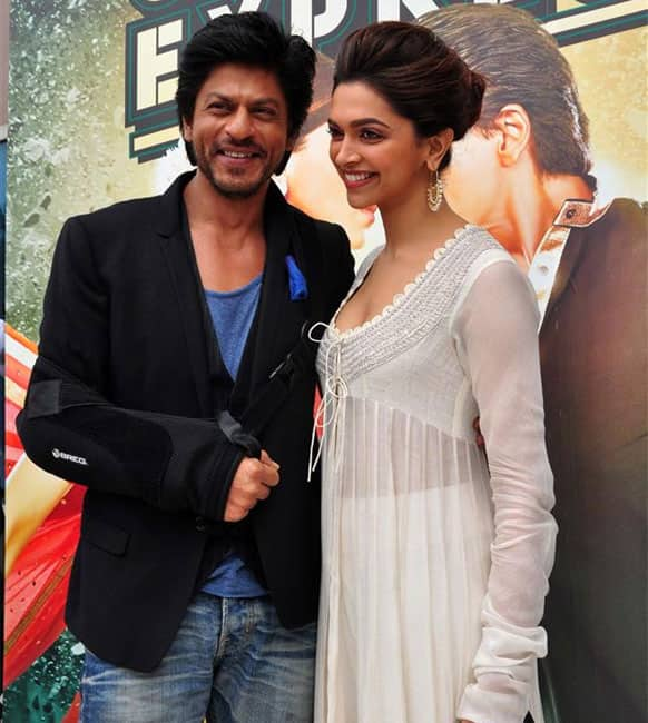 Shah Rukh Khan and Deepika Padukone pose for the lenses at the trailer launch of their upcoming release, 'Chennai Express'.