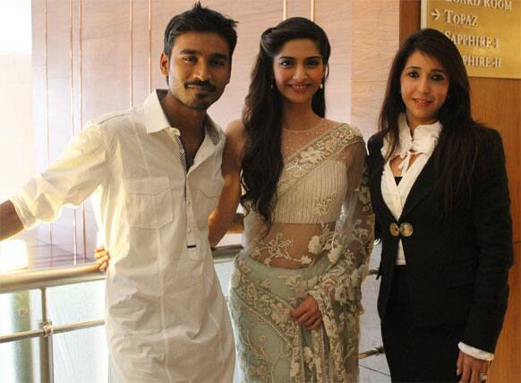 'Raanjhanaa' starcast Dhanush and Sonam poses for the lenses with producer Krishika Lulla in New Delhi.