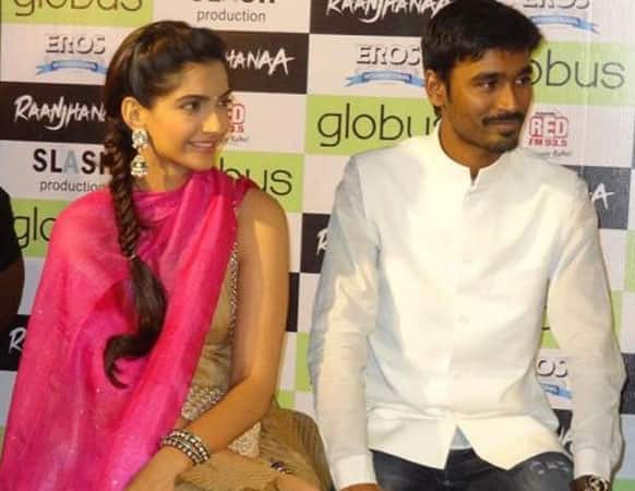 Sonam and Dhanush address the media during a promotion event in Gujrat's capital.