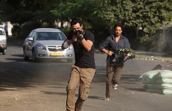 Arjun Rampal and Irrfan Khan in a still from 'D-Day'.