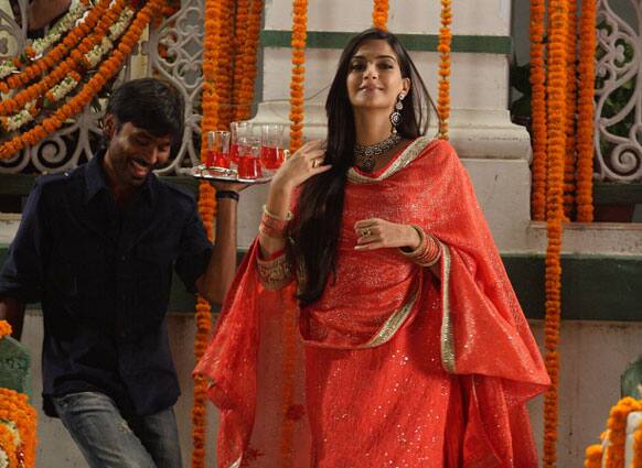 Dhanush at the beck and call of his ladylove Sonam in 'Raanjhanaa'.