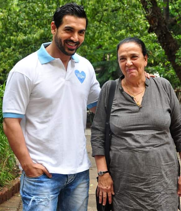 John Abraham poses with his mother Firoza Irani at the 'Thank You Mom' initiative by P&G.