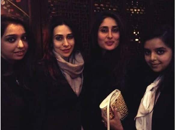 Karisma Kapoor poses with her sister Kareena and friends during Lolo's birthday celebrations in London.