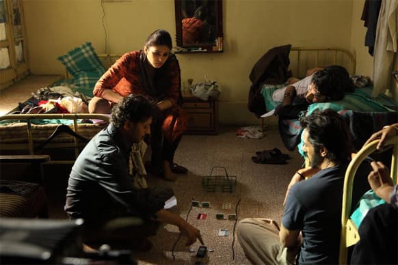 Huma Qureshi, Irrfan Khan, Arjun Rampal and Sandeep Kulkarni in a still from 'D-Day'.