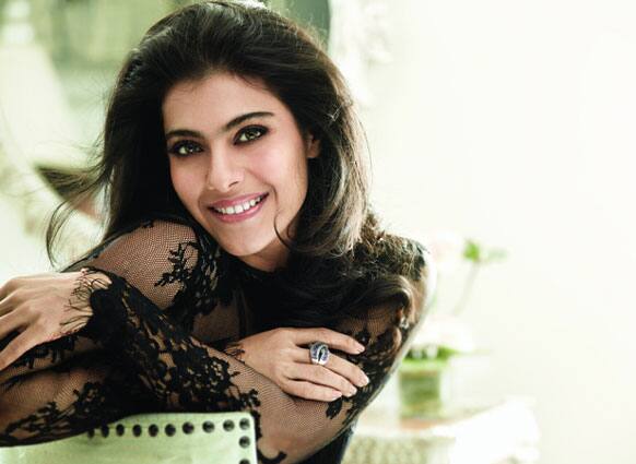 Kajol strikes a pose wearing a black, lacy dress for Filmfare magazine's photoshoot. (Pic courtesy: Filmfare)