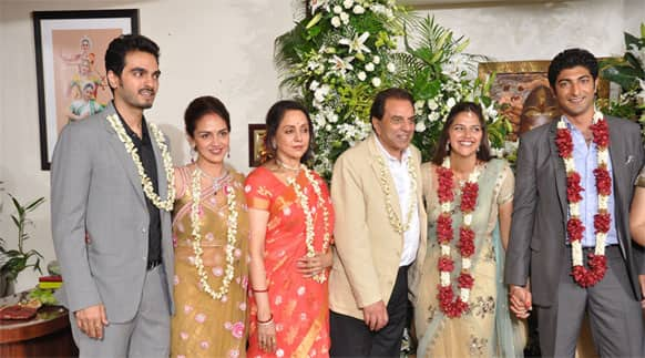 We are family: Hema Malini and Dharmendra pose for a family picture with their daughters and sons-in-law.