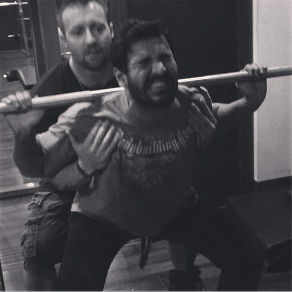 John Abraham snapped in the midst of an intense work-out session.