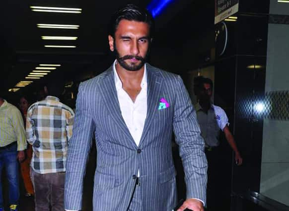 Spotted at the airport: Ranveer Singh winks at the lensmen.