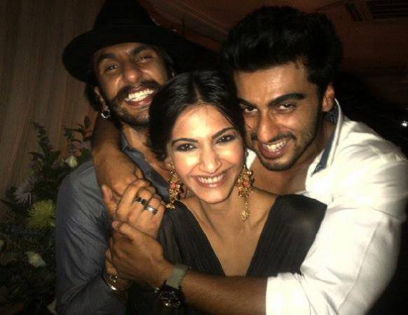 Sonam Kapoor poses along with cousin Arjun Kapoor and actor Ranveer Singh  .