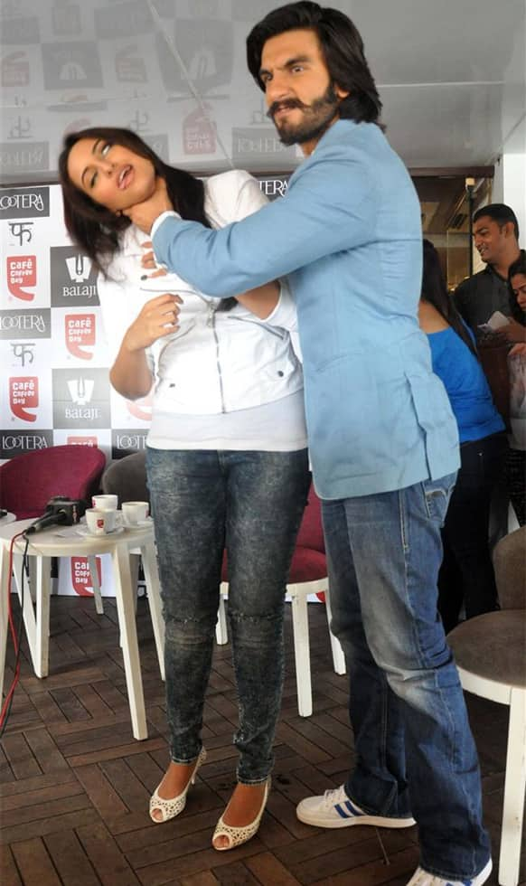 Ranveer Singh mimes strangling his 'Lootera' co-star Sonakshi Sinha during a promotional stint for the film.