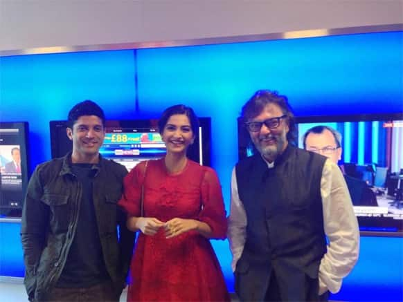 Farhan Akhtar, Sonam Kapoor and Rakeysh Omprakash Mehra pose for a photograph during the London promotions of 'Bhaag Milkha Bhaag'.