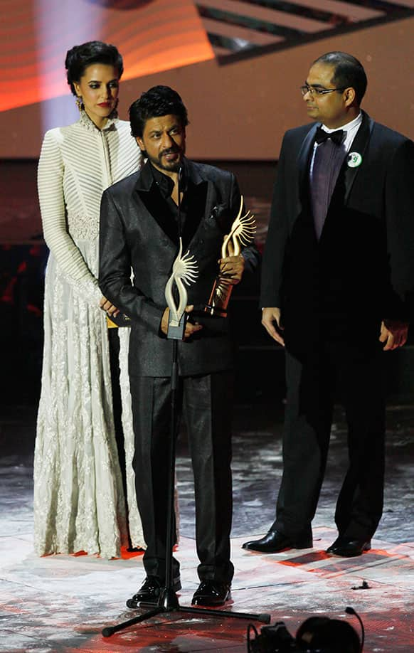 Bollywood actor Shah Rukh Khan receives the Digital Star of the Year award during the International Indian Film Academy (IIFA) awards in Macau.