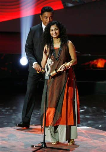 Gauri Shinde receives the award for Debutant Director during the International Indian Film Academy.