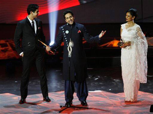 Ayushmann Khurana receives the award for Male Debutant Star during the IIFA Awards.