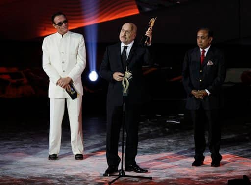 Anupam Kher receives the award for Outstanding Contribution by an Indian to International Cinema during the International Indian Film Academy.