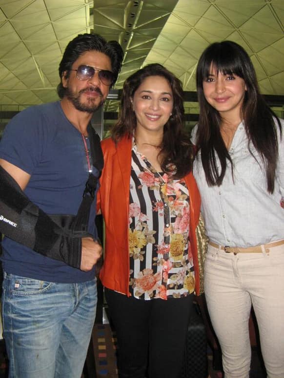 Shah Rukh Khan, Madhuri Dixit and Anushka Sharma pose for a photograph after returning from Macau. Pic courtesy: @MadhuriDixit1 