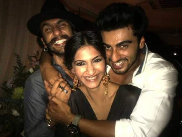 Sonam Kapoor, Arjun Kapoor and Ranveer Singh give a big smile for the camera.