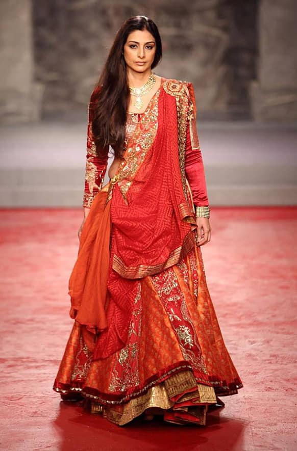 Tabu looked an epitome of ageless beauty as she walked the ramp for PCJ Delhi Couture Week 2013.