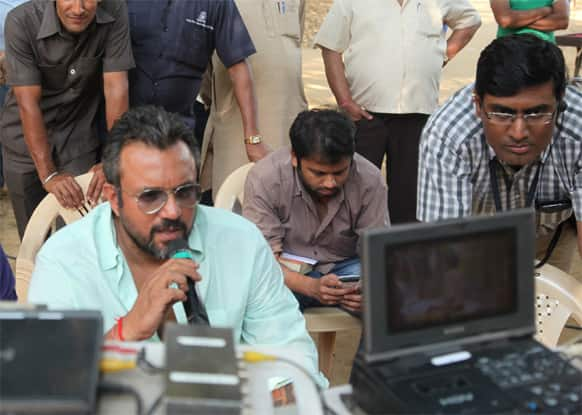 Director Apoorva Lakhia at work with his crew on the sets of 'Zanjeer'.