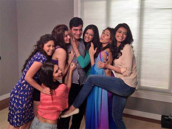 'Grand Masti' director Indra Kumar is flanked by his heroines in this picture.