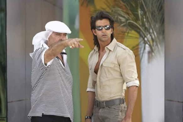 Hrithik Roshan in conversation with his father Rakesh Roshan on the sets of 'Krrish 3'.