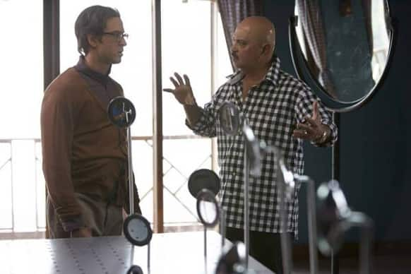 Rakesh Roshan giving directions to Hrithik Roshan while shooting for 'Krrish 3'.