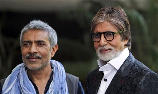 Amitabh Bachchan and director Prakash Jha attend a promotional event for their upcoming movie 'Satyagraha' in New Delhi.