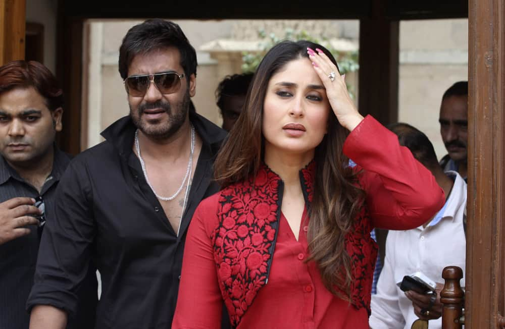 Kareena Kapoor and Ajay Devgn arrive for a press conference to promote their upcoming movie 'Satyagraha' in Ahmadabad.