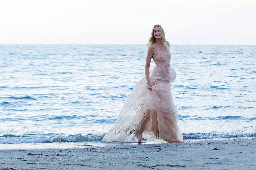 Actress Eva Riccobono, who will host the 70th edition of the Venice Film Festival, poses for photographers during a photo call in Venice.