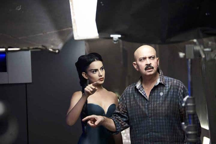 Kangna Ranaut on the sets of 'Krrish 3' with filmmaker Rakesh Roshan.