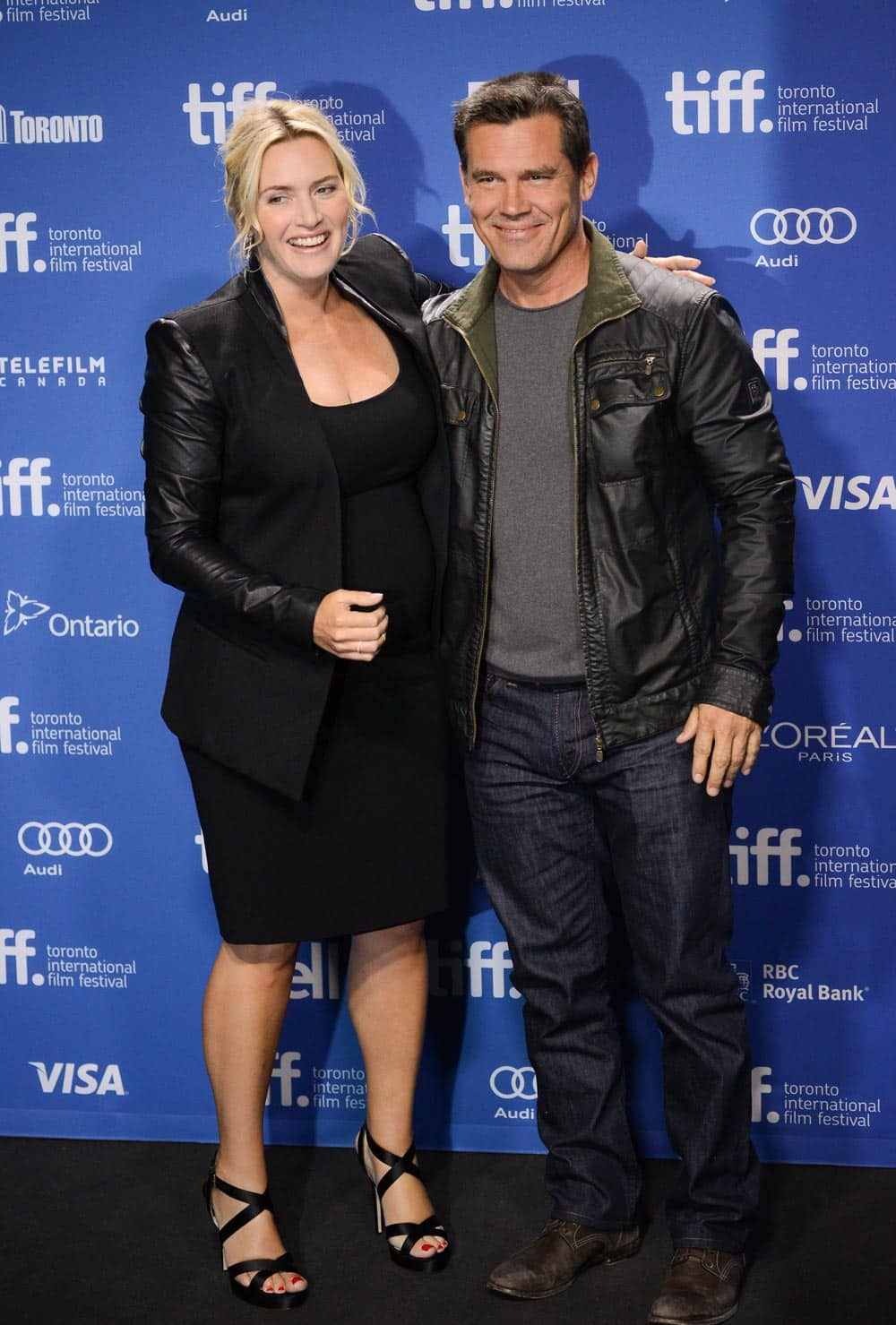 Actor Kate Winslet and Josh Brolin participate in the press conference for 