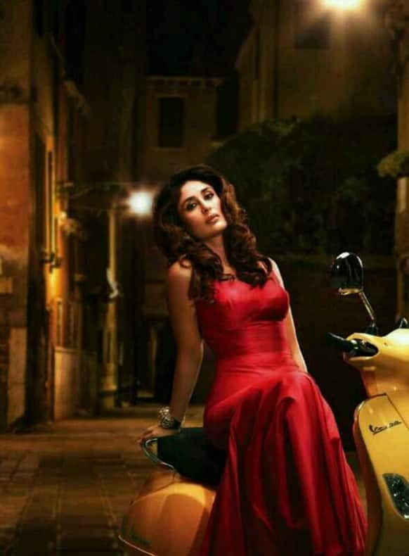 Kareena looks attractive in the deep red gown she is wearing in this picture.