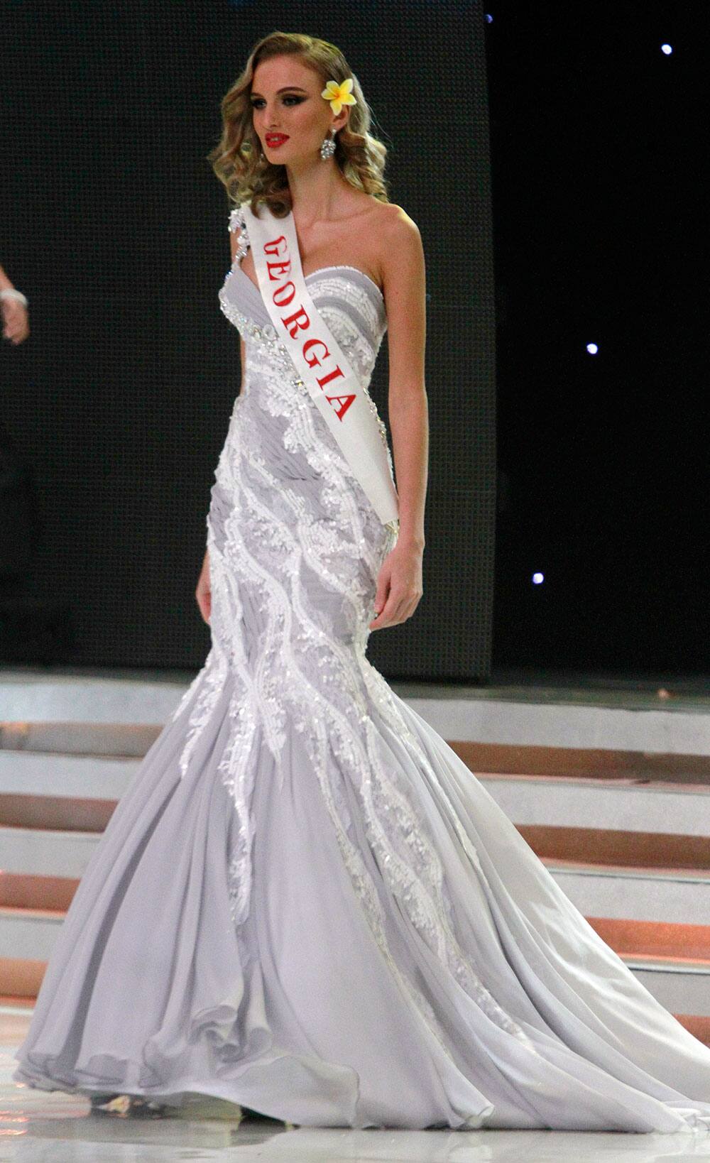 Miss Georgia Tamar Shedaniai walks on stage during opening of the 63rd Miss World Pageant ceremony in Nusa Dua, Bali, Indonesia.