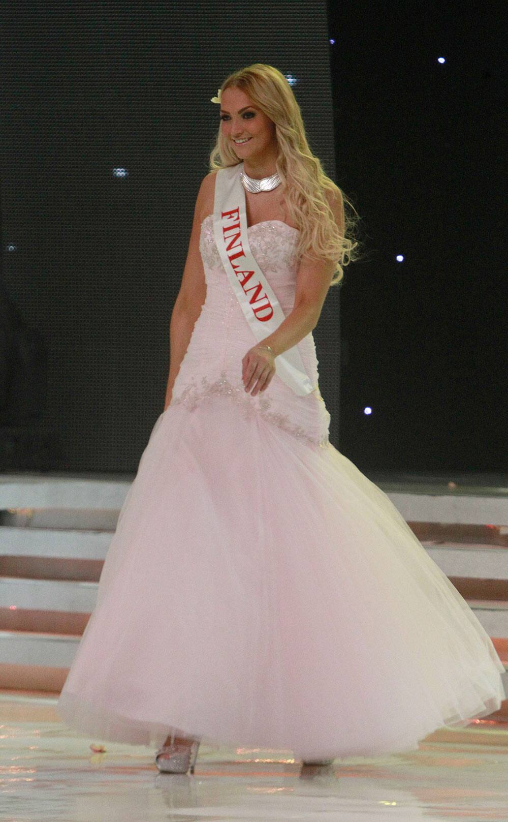 Miss Finland Maija Kerisalmi walks on stage during the opening of the 63rd Miss World Pageant ceremony in Nusa Dua, Bali, Indonesia.