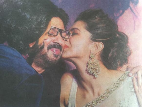 Deepika Padukone and Ranveer Singh kiss Sanjay Leela Bhansali at the trailer launch event of 'Ram Leela'. (Pic courtesy: @maheepkapoor)