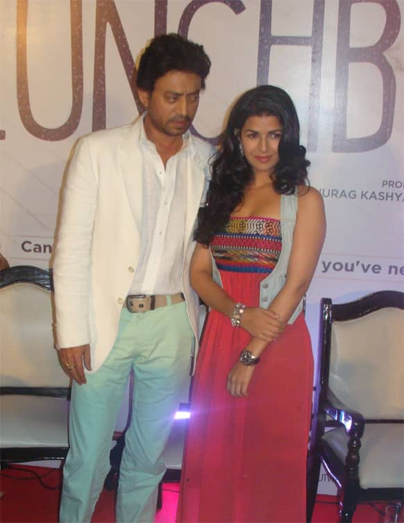 Irrfan Khan and Nimrat Kaur pose for the cameramen during 'The Lunchbox' promotions.