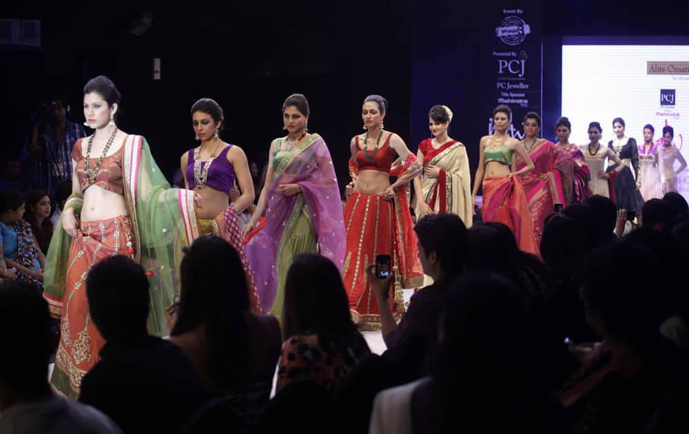 Models display creations by Niti Mehta during the India Jewellery and Fashion Week (IJFW) in Ahmadabad.