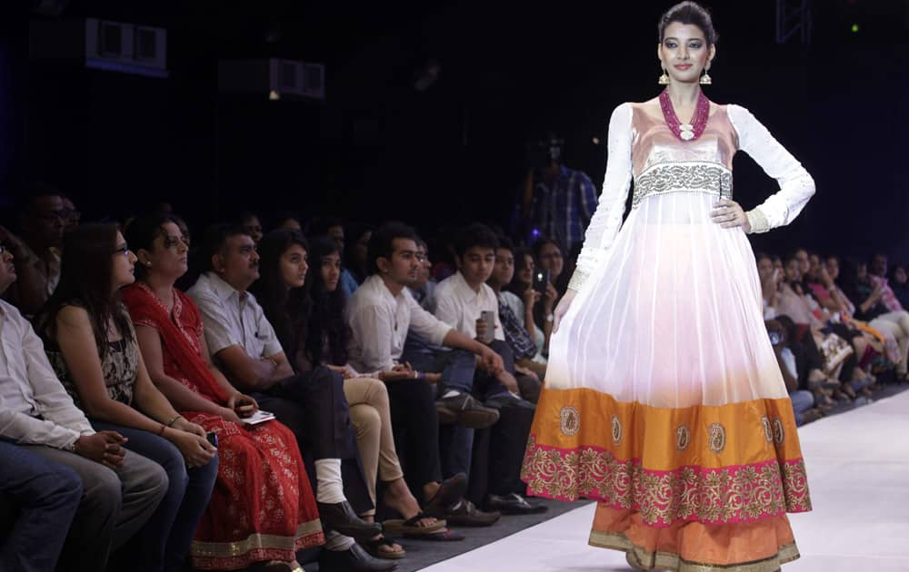 A model displays a creation by Niti Mehta during the India Jewellery and Fashion Week (IJFW) in Ahmadabad.