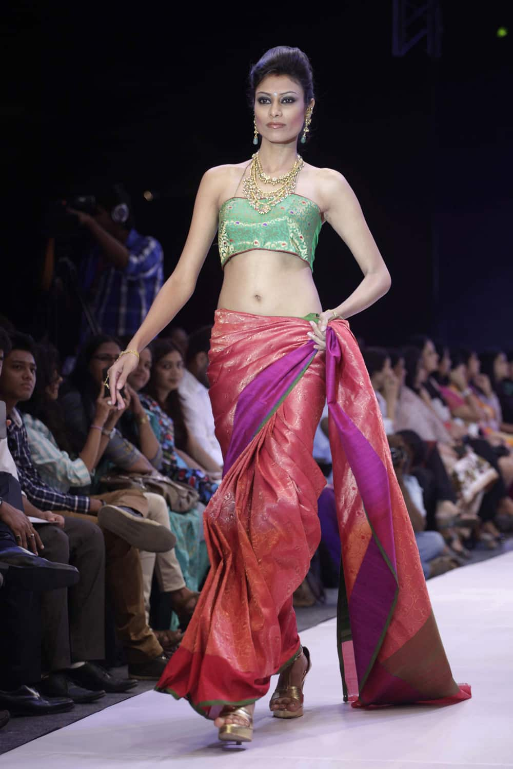 A model displays a creation by Niti Mehta during the India Jewellery and Fashion Week (IJFW) in Ahmadabad.