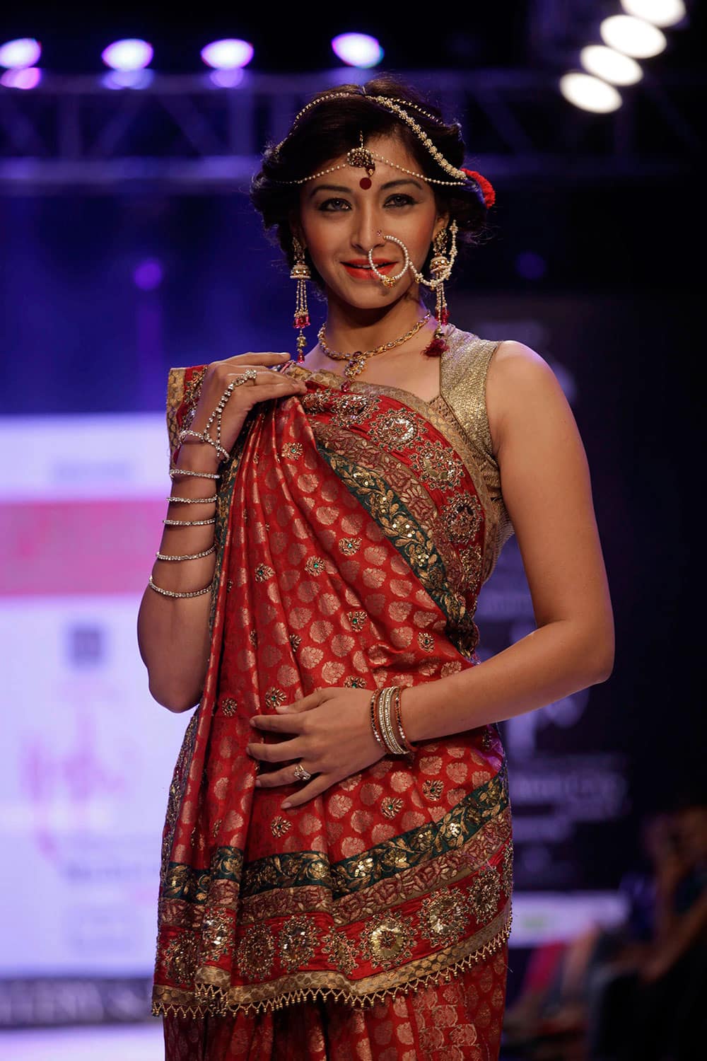 A model displays a creation by Palak`s Couture during India Jewelery and Fashion Week(IJFW) in Ahmadabad.