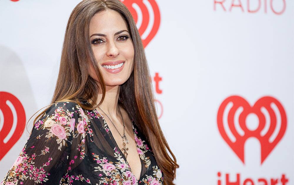 Kerri Kasem arrives at the iHeartRadio Music Festival, at the MGM Grand Garden Arena in Las Vegas.