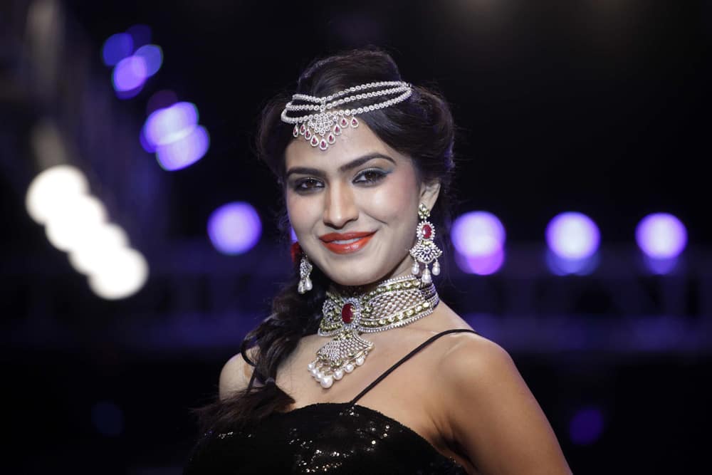 A model displays a creation by Kiah during the India Jewelry and Fashion Week in Ahmedabad.