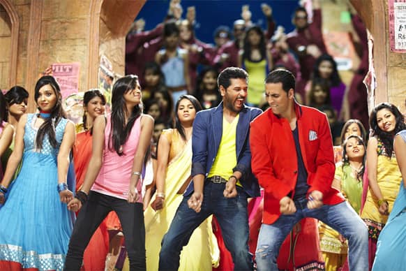 Akshay Kumar matching dance steps with Prabhudeva in this still from 'BOSS'.